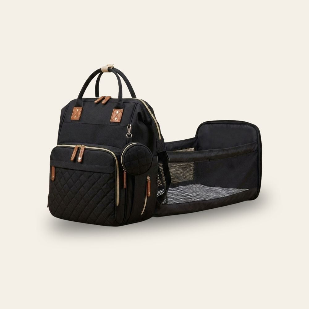 Sac à langer sac à dos Shibi noir avec lit d'appoint bébé intégré, vue de profil